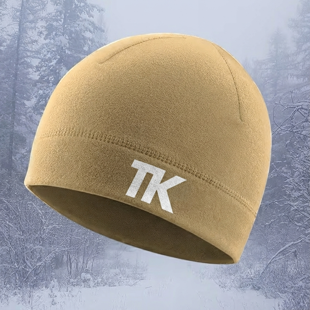 Close-up of a single green leaf against a white background.